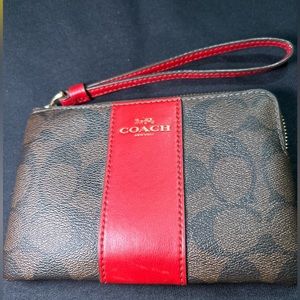 Coach Corner Zip Wristlet In Signature Canvas